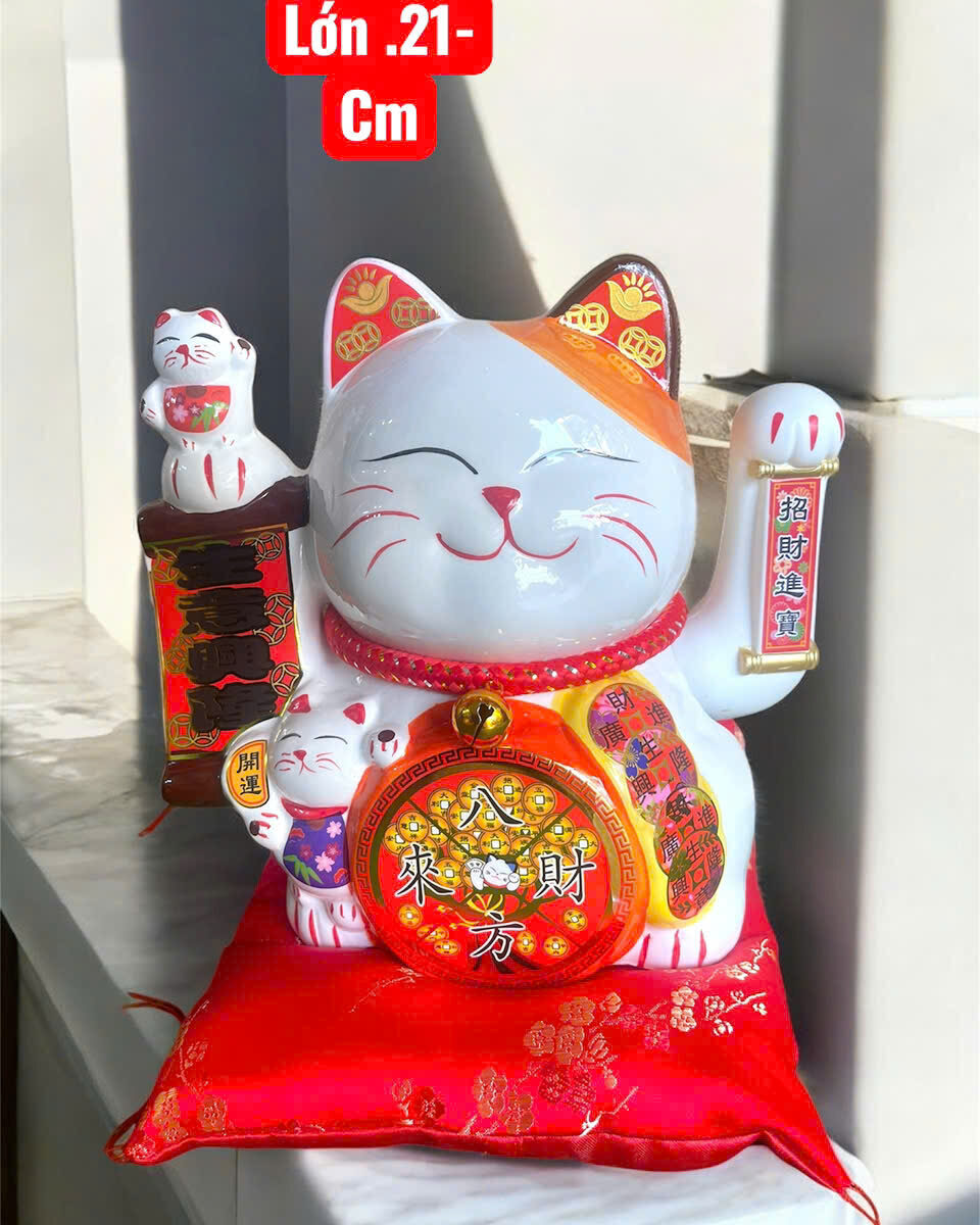 MÈO SỨ VẨY TAY ĐỂ QUÀY THU NGÂN